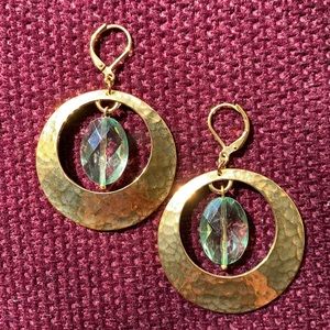 Gold hanging earrings with green gem